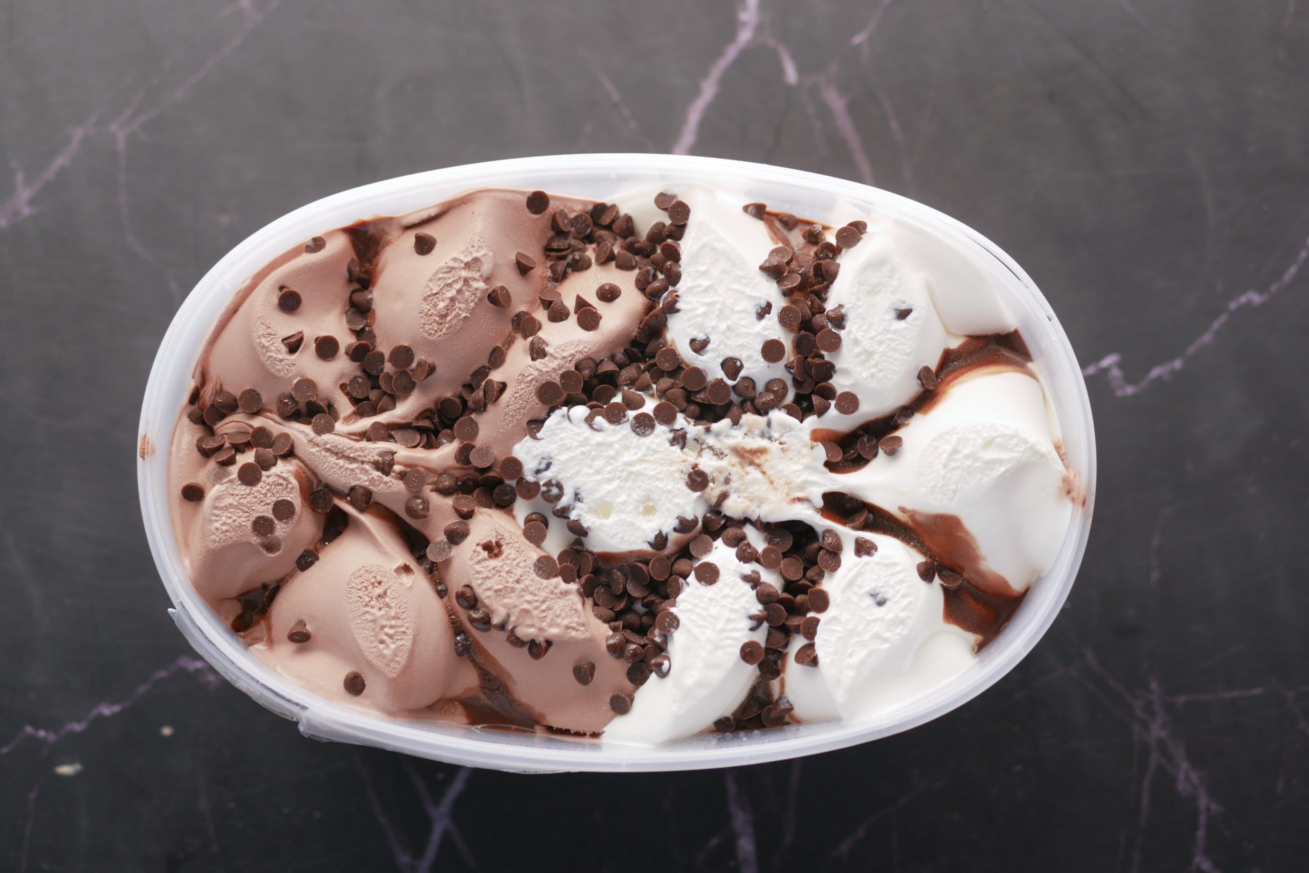 Ice cream container with ice cream in it