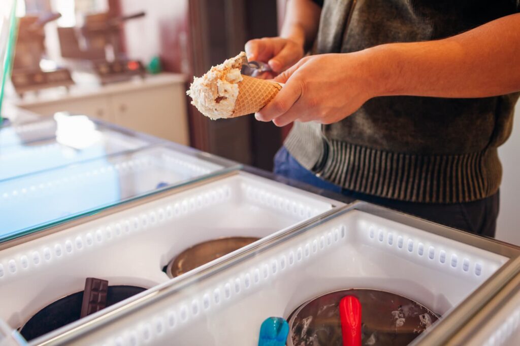 Is it better to store ice cream in a glass or plastic container?